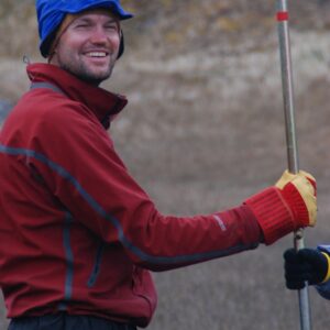 A person holding a baseball bat.