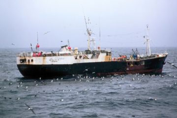 A large ship in a body of water.