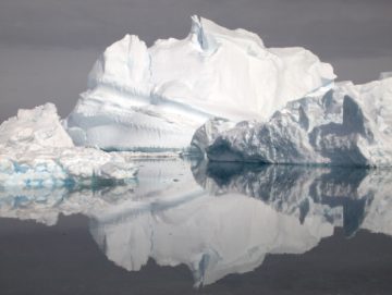 A close up of a snow covered mountain.