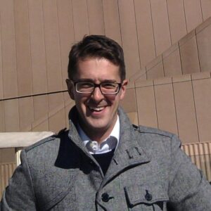 A man wearing glasses.