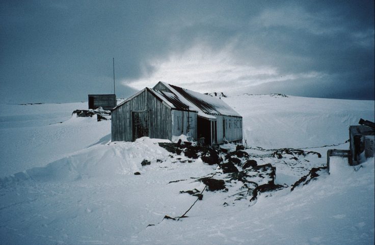 A close up of a snow covered Detaille Island Station.