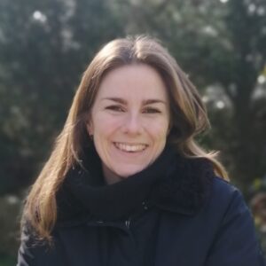 A woman smiling for the camera