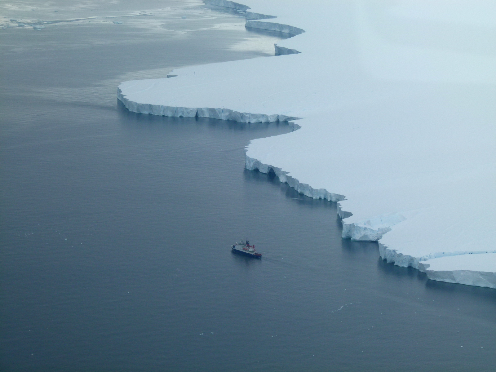 A small boat in a body of water