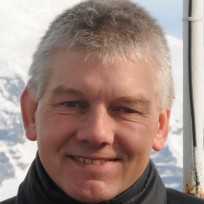 A man smiling for the camera.