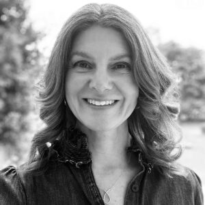 A woman smiling for the camera