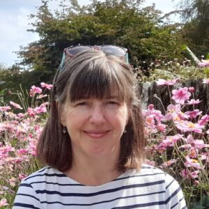 A person standing in a garden