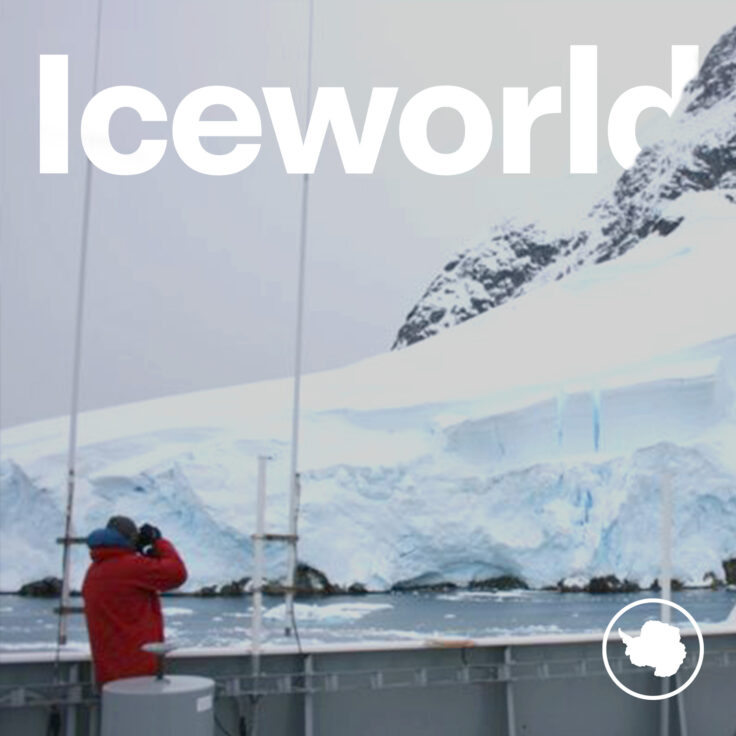 A group of people standing in front of a mountain