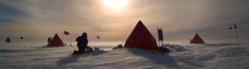 A BAS camp of small tents in an icy landscape