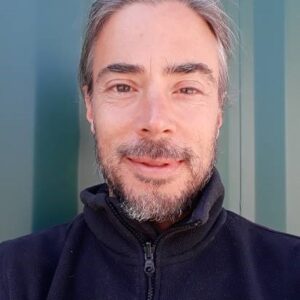 A man smiling for the camera.