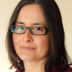 A close up of a woman wearing glasses