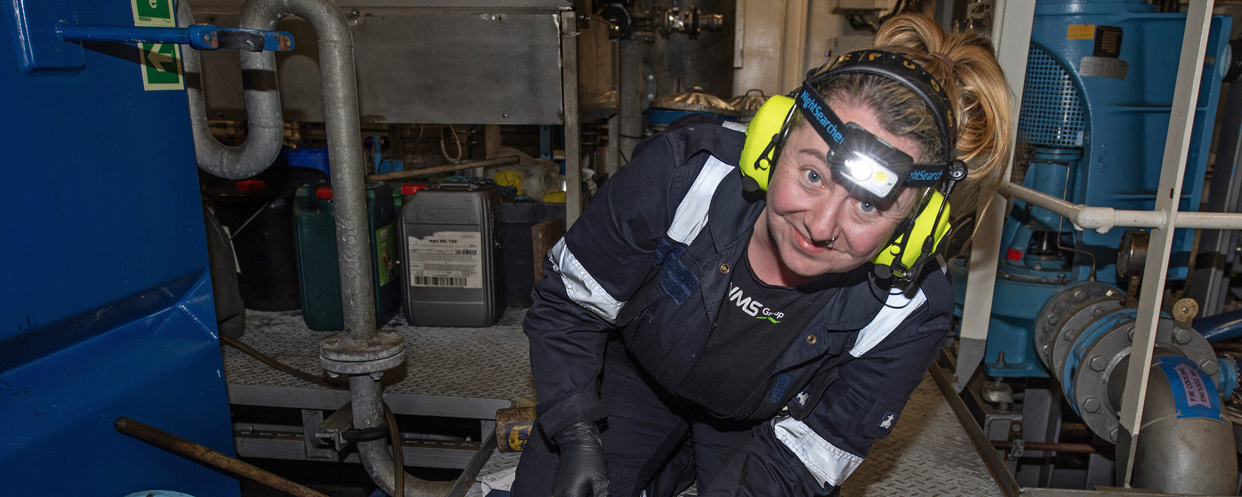 A person sitting posing for the camera