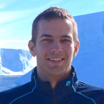 A man smiling for the camera.