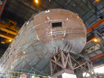 Metal scaffolding in front of a building.