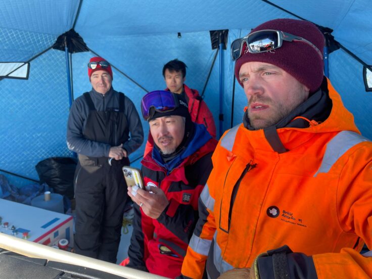 A group of people posing for the camera