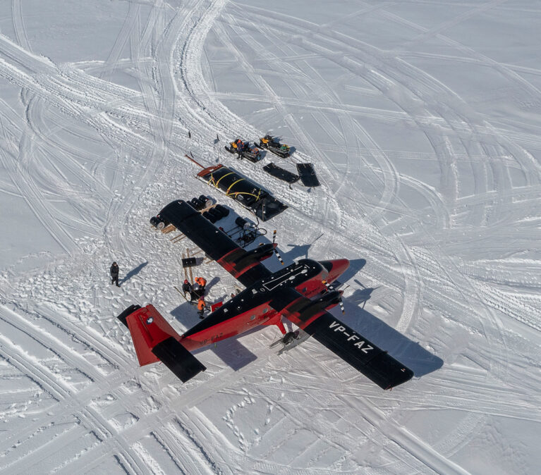 Twin Otter aircraft at a deep field site on the English Coast, Antarctica