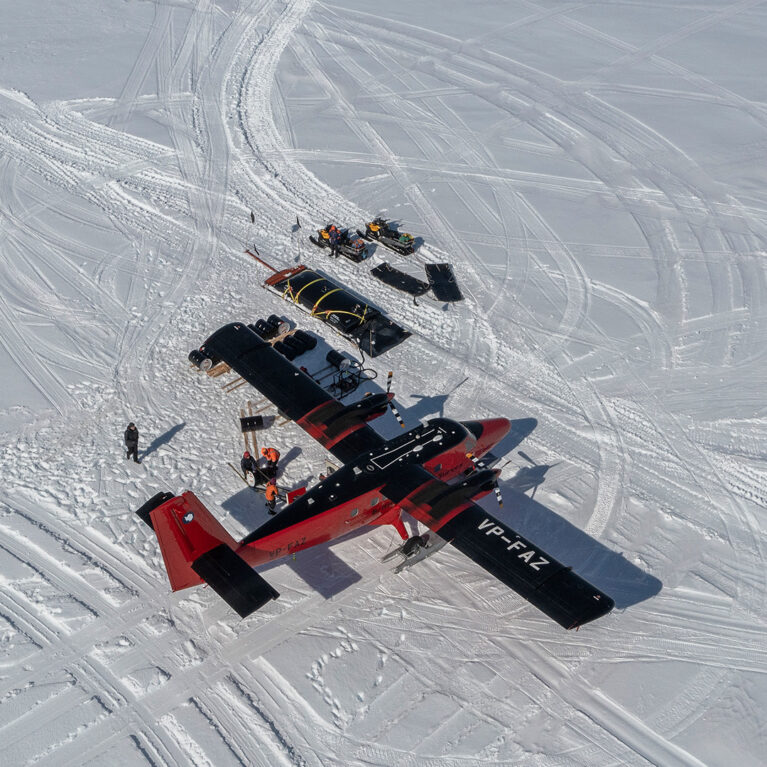 Twin Otter aircraft at a deep field site on the English Coast, Antarctica