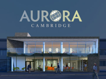 A sign in front of a building.