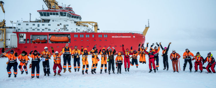 SDA crew celebrate successful trials on the sea ice in front of the ship